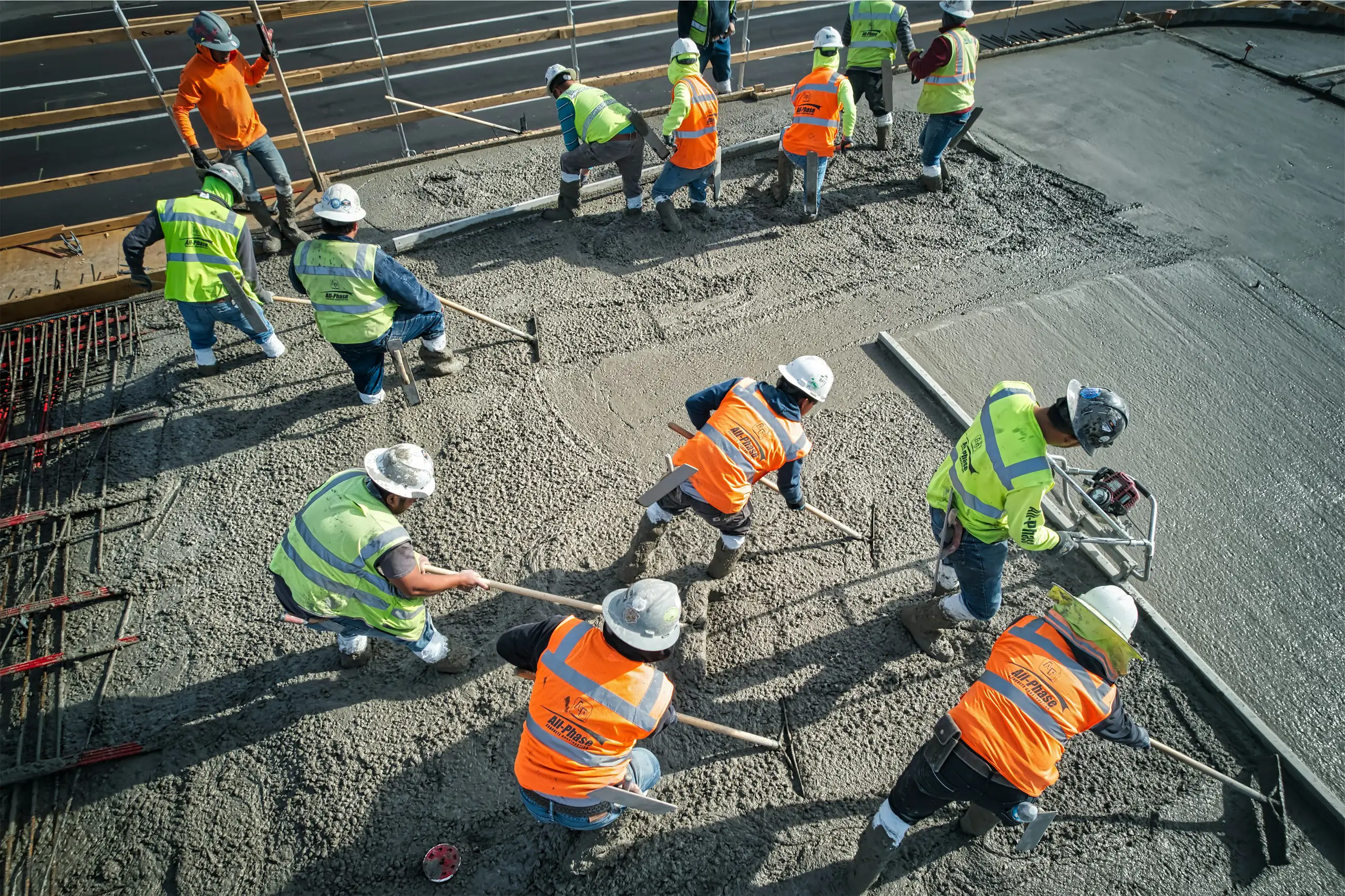 Concrete crew pouring cement